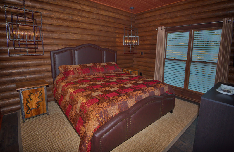 Cabin bedroom at Cut Above Cabins.