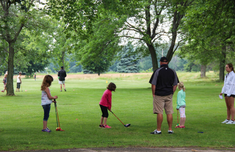 Golf lessons at Coachman's Golf Resort.