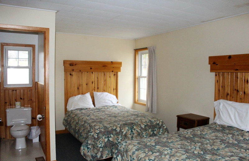 Cabin bedroom at Tally Ho Inn.