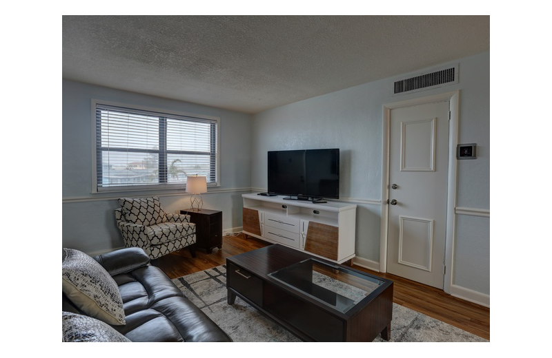 Guest living room at Gulf Winds Resort Condominiums.