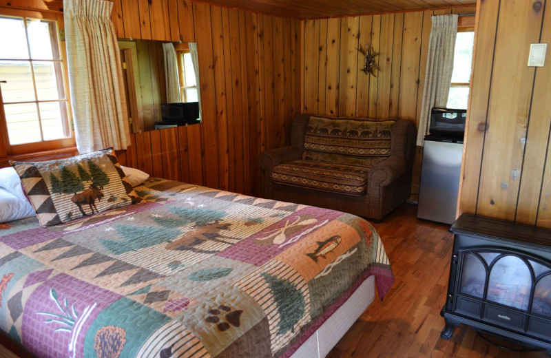 Cabin bedroom at Shoshone Lodge & Guest Ranch.