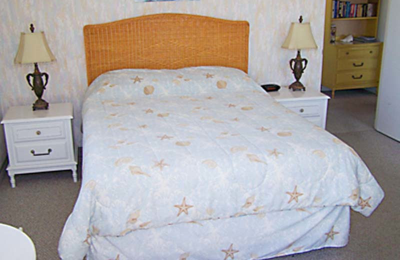 Vacation rental bedroom at Gulf Winds Resort Condominiums.