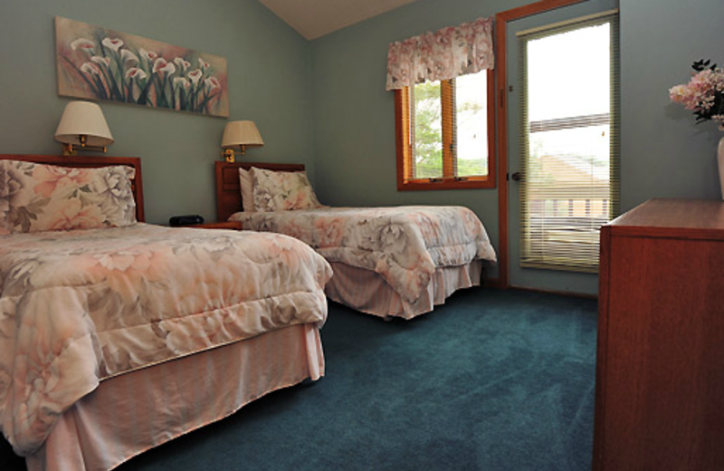 Vacation rental bedroom at Deerfield Village Resort.