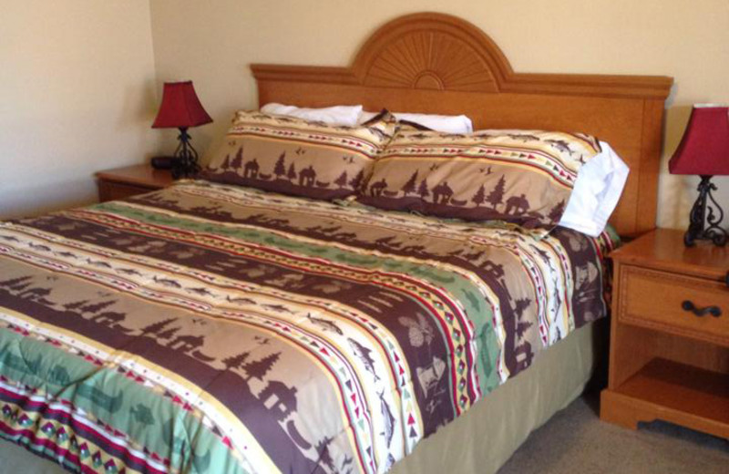 Guest bed at Hochatown Country Lodge.