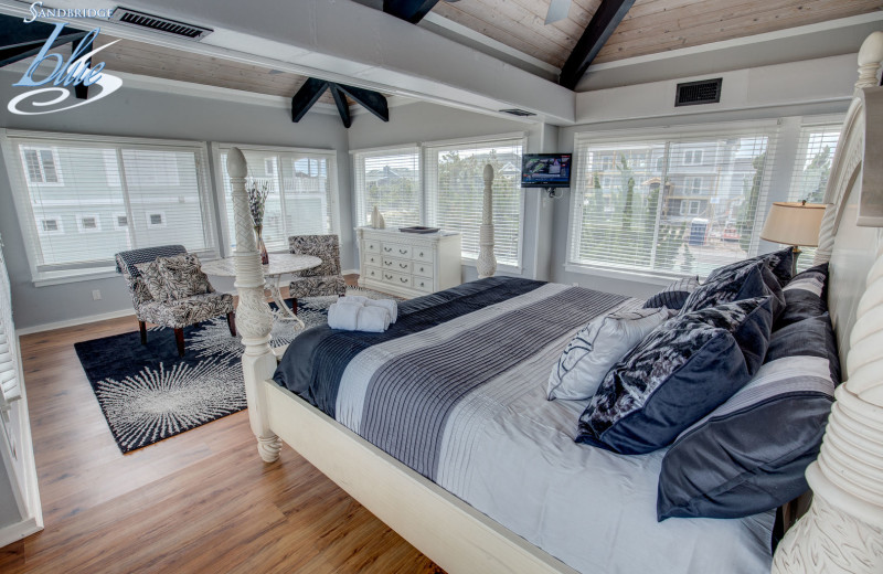 Rental bedroom at Sandbridge Blue Vacation Rentals.