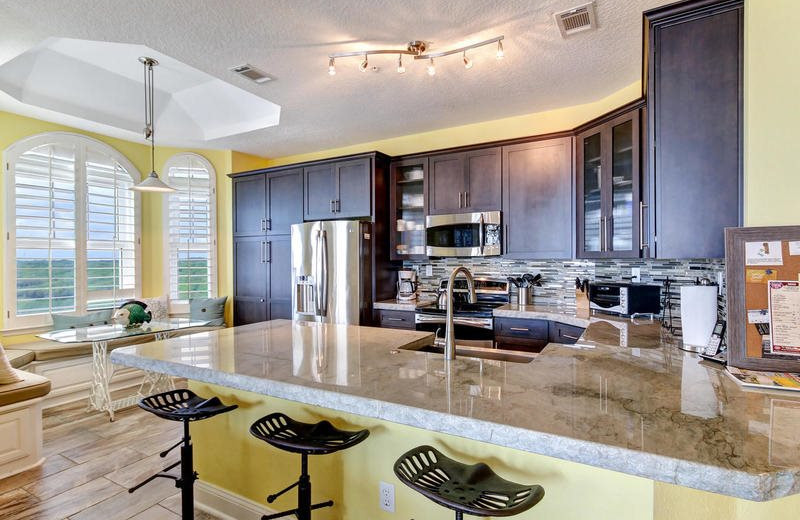 Rental kitchen at Beach Vacation Rentals.