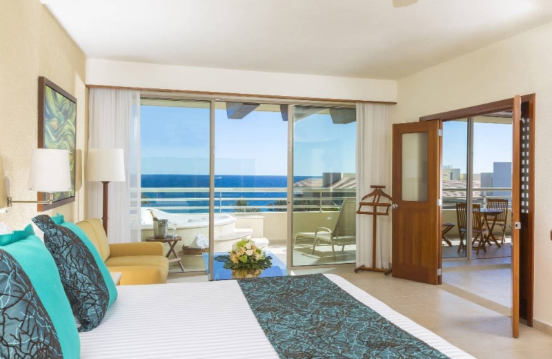 Guest room at Barcelo Los Cabos Palace Deluxe.