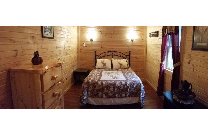 Cabin bedroom at Hocking Hills Backwoods Retreat.