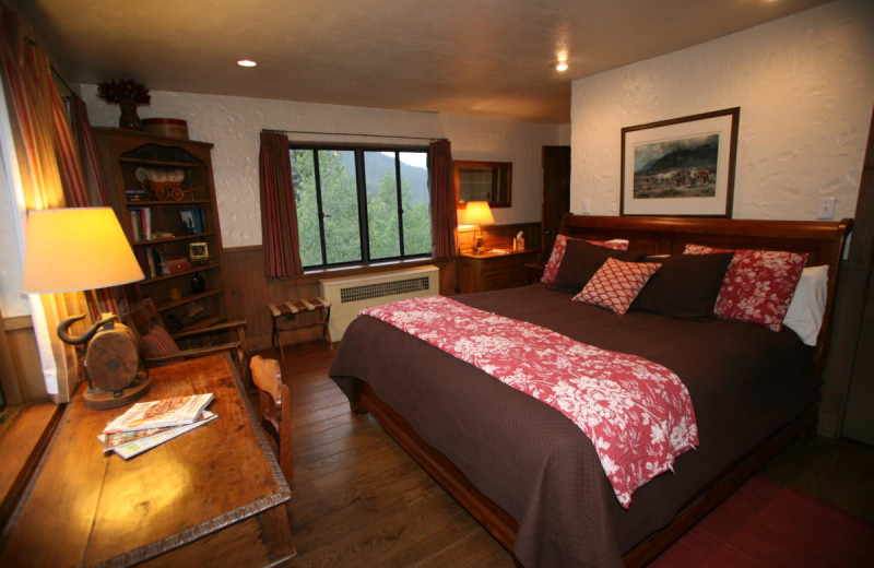 Cabin bedroom at Tumbling River Ranch.