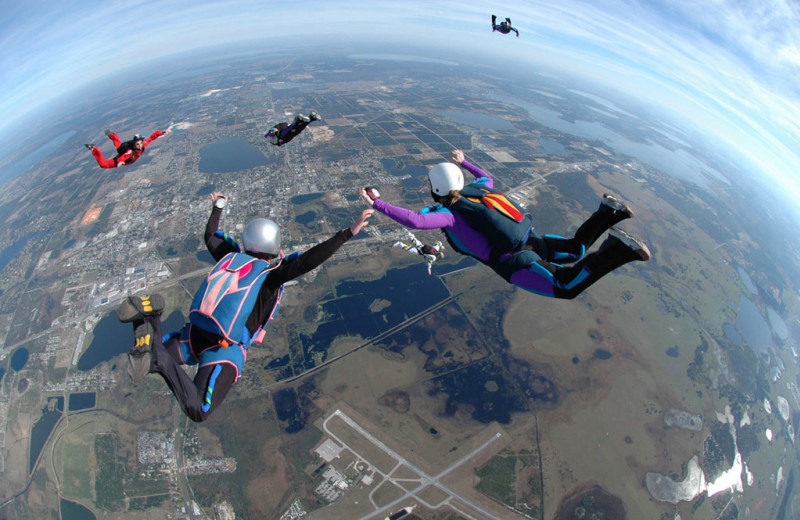 Sky diving near Grizzly Jacks Grand Bear Resort.