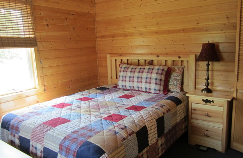 Cabin bedroom at Kec's Kove Resort.