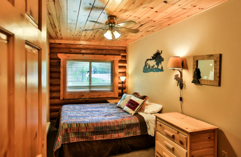 Cabin bedroom at Northern Lights Resort & Outfitting.