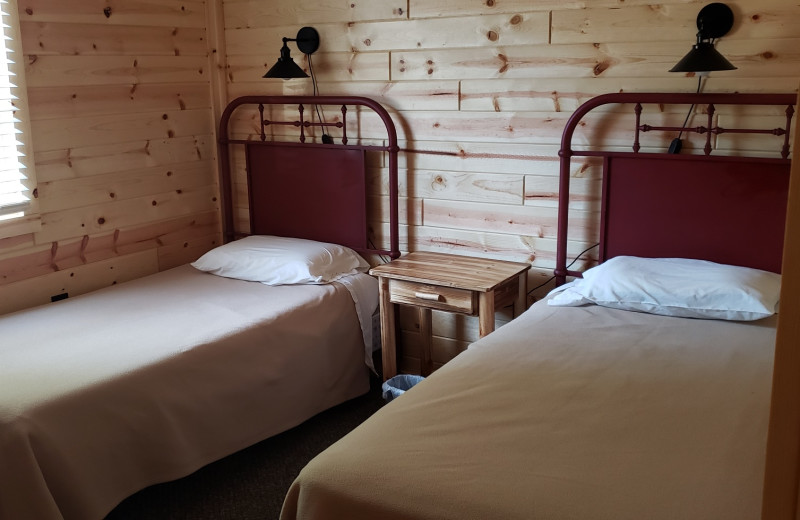 Cabin bedroom at Cozy Bay Resort.