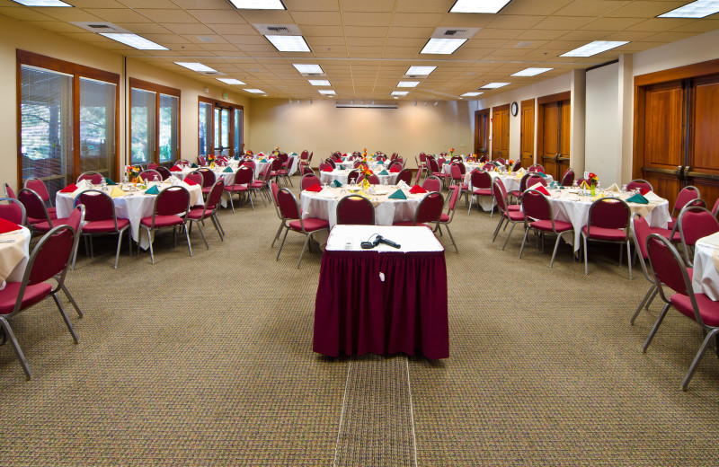 Winters Hope, set for group dinner, floor to ceiling window at Mount Bachelor Village Resort.
