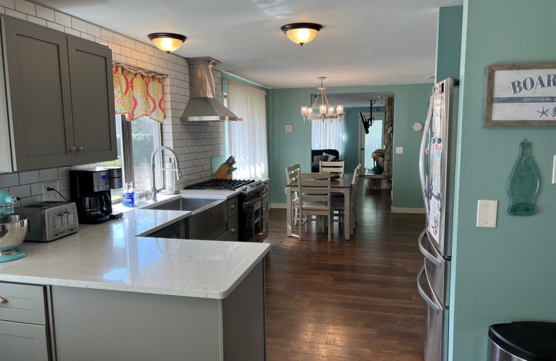 Rental kitchen at Beachhouse Vacation Rentals.