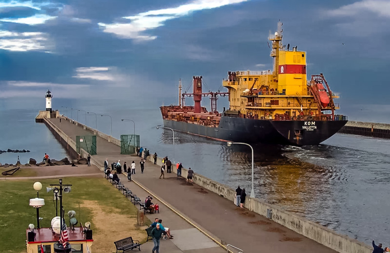 Ship passing through canal at South Pier Inn.