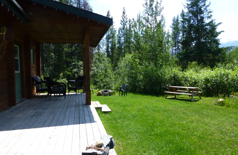 porch and picnic area at the Pine cabin, Mica Mountain Lodge & log cabins & side by side ATV tours