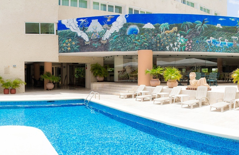 Outdoor pool at Hotel Los Aluxes.