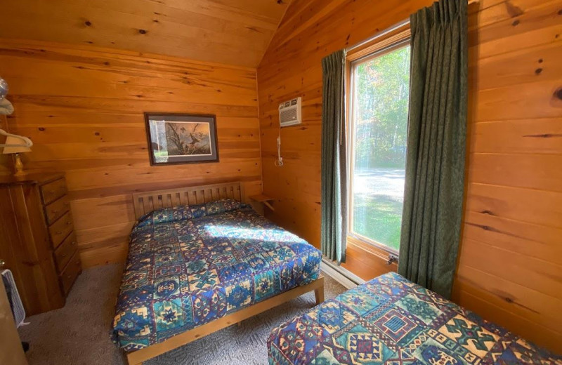 Cabin bedroom at Pehrson Lodge Resort.