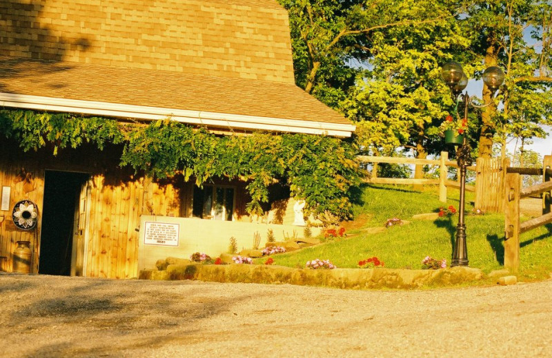 Exterior view of Guggisberg Swiss Inn/Amish Country Riding Stables.