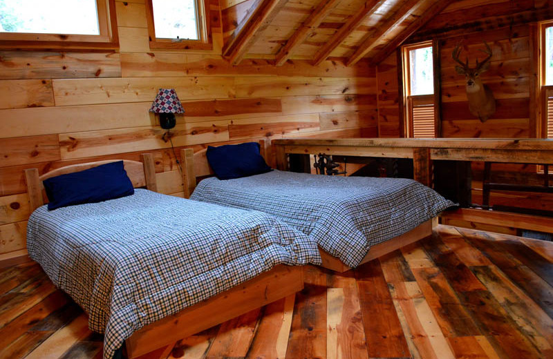 Cabin bedroom at Backroads Inn and Cabins.