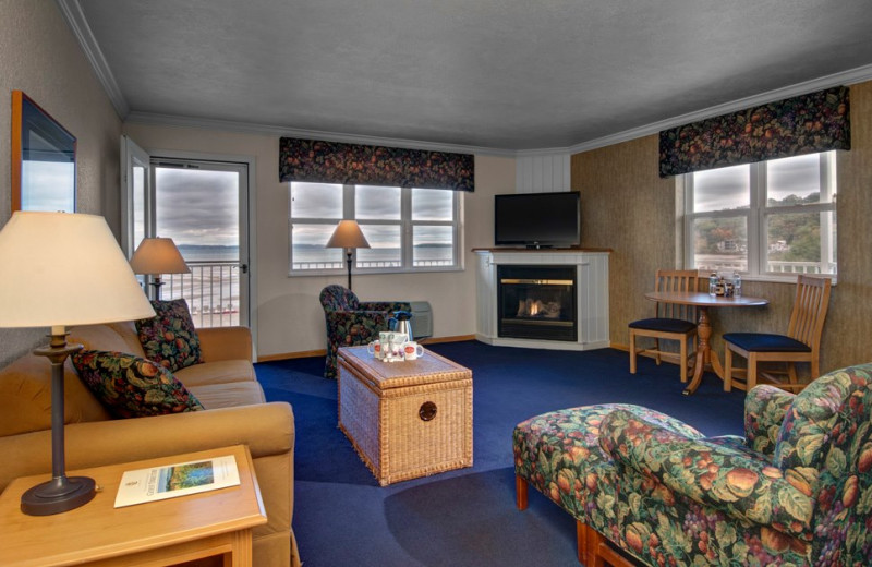 Fireplace guest living room at The Cherry Tree Inn & Suites.