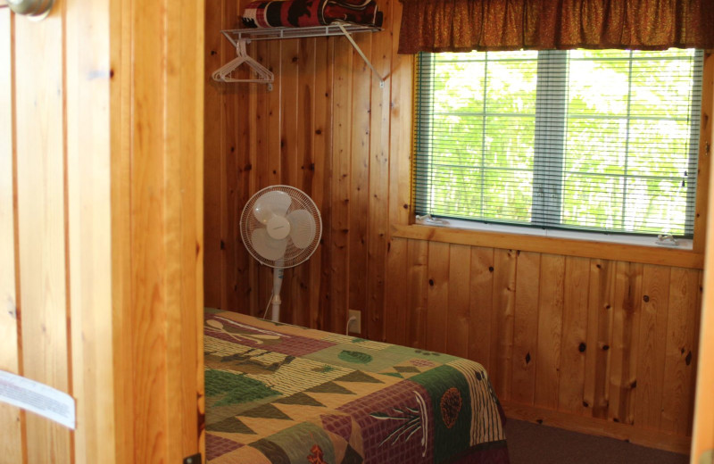 Cabin bedroom at Timber Trails Resort.