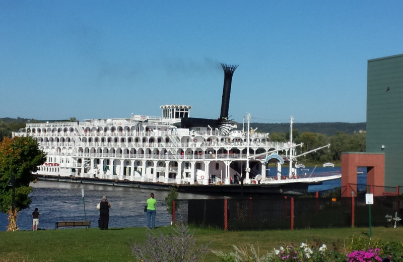 Boat at Eagles on the River and Anderson House Hotel.