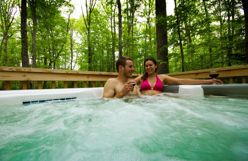 Cabin hot tub at Country Road Cabins.