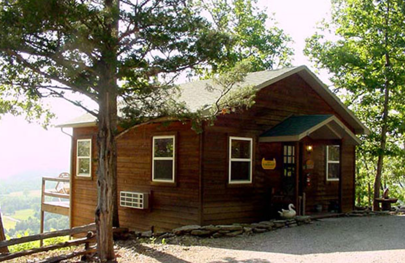 Exterior cabin View at Can-U-Canoe Riverview Cabins.