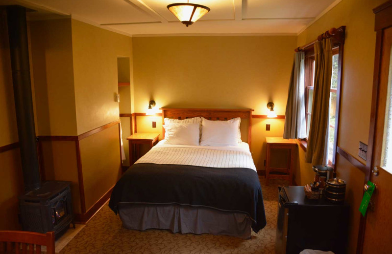 Cabin bedroom at Johnston Canyon Lodge & Bungalows.