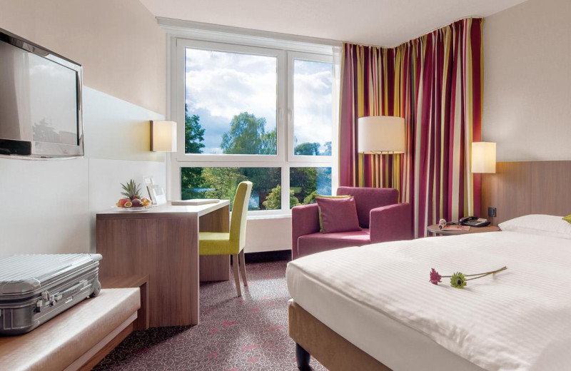 Guest room at Golden Tulip Parkhotel Neu-Ulm.