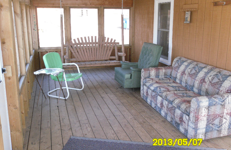 Cabin porch at Red School Resort.