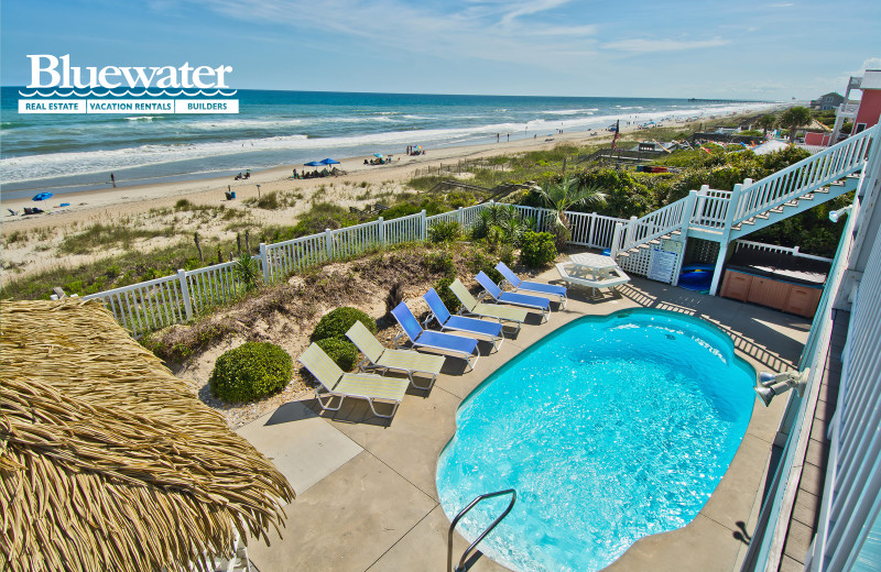 Rental pool and beach at Bluewater Real Estate.