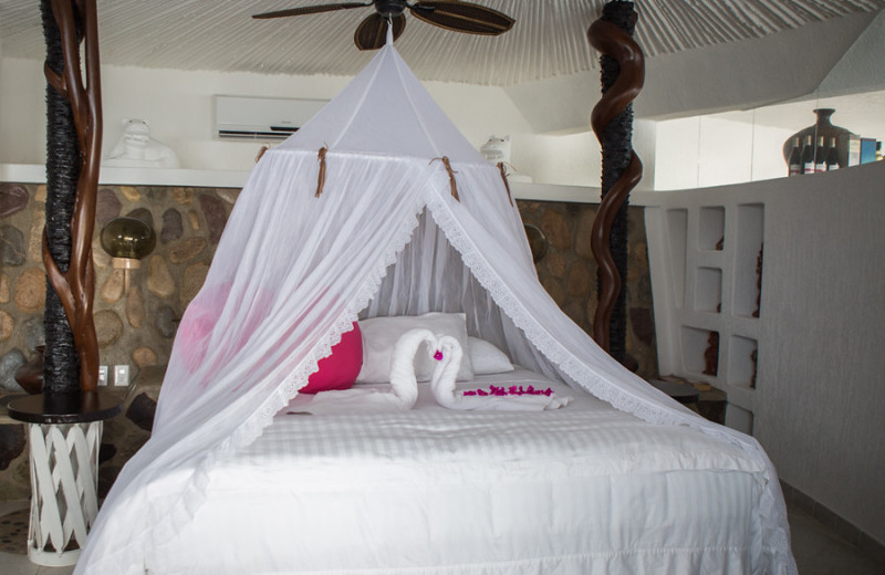 Villa bedroom at Ocho Cascadas Resort.