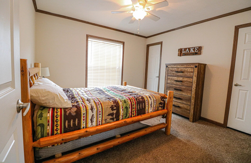 Cabin bedroom at Sand Lake Resort.