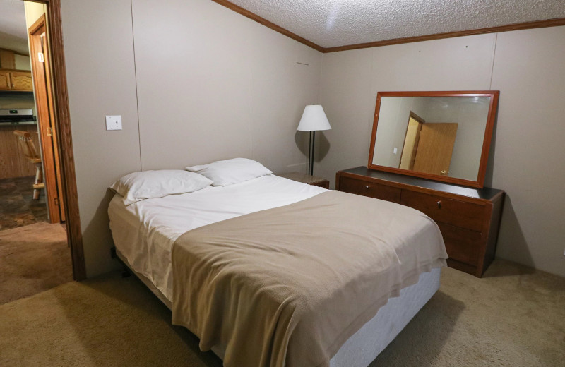 Cabin bedroom at Sand Lake Resort.