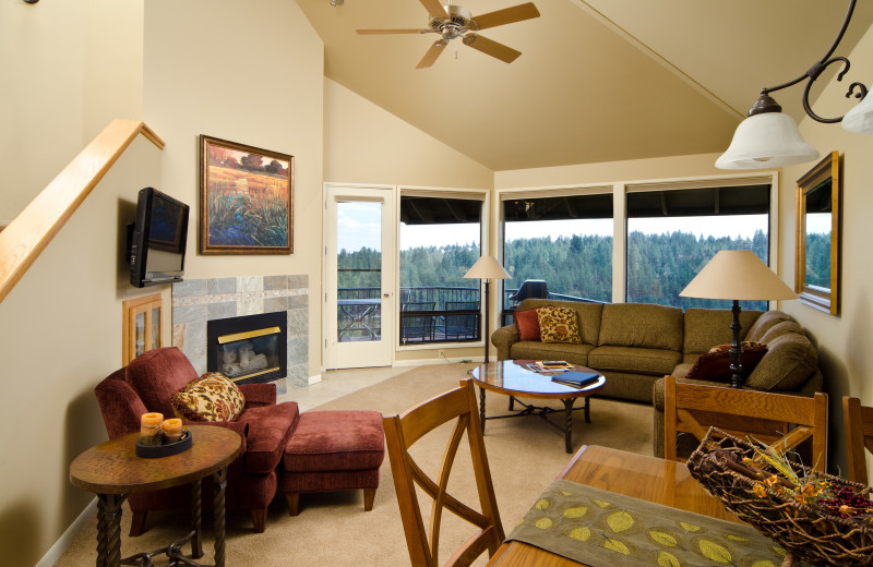 Living and dining room of a River Ridge Condo at Mount Bachelor Village Resort.
