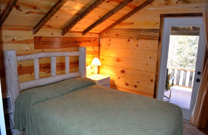 Cabin bedroom at Backroads Inn and Cabins.