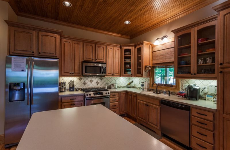 Cabin kitchen at Mountain Oasis Cabin Rentals.
