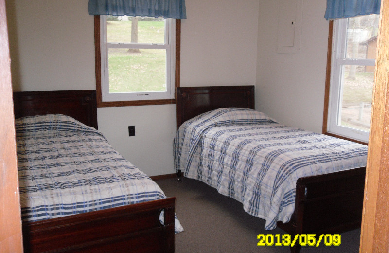 Cabin bedroom at Red School Resort.