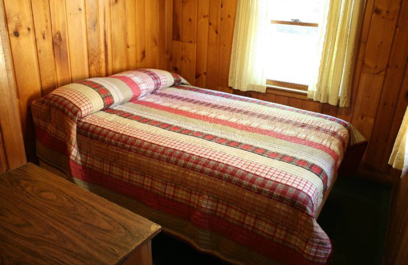 Cabin bedroom at Bladow Beach Resort & Campground.
