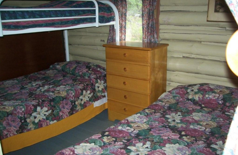 Cabin bedroom at Silv'ry Moon Lodge.