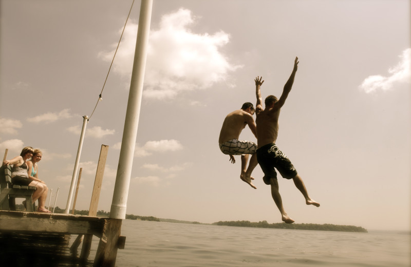 Jumping in lake at Southview Cottages Resort.