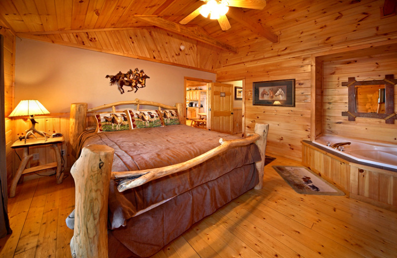 Cabin bedroom at SmokyMountains.com.