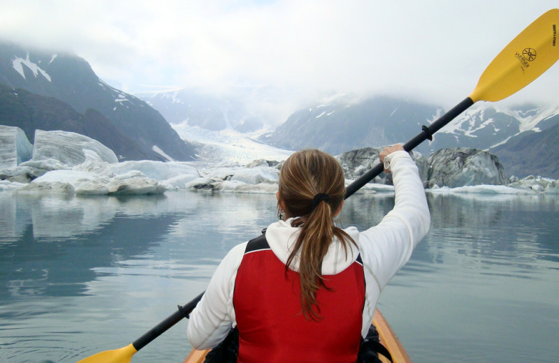 Kayaking through glacier at Kenai Fjords Glacier Lodge.