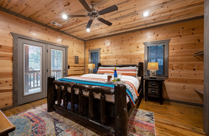 Rental bedroom at Blue Beaver Luxury Cabins.