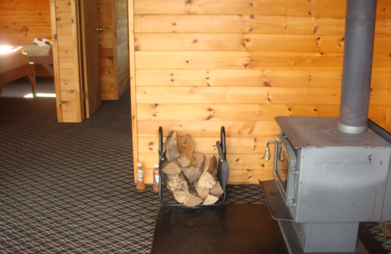 Cabin fireplace at Maynard Lake Lodge and Outpost.