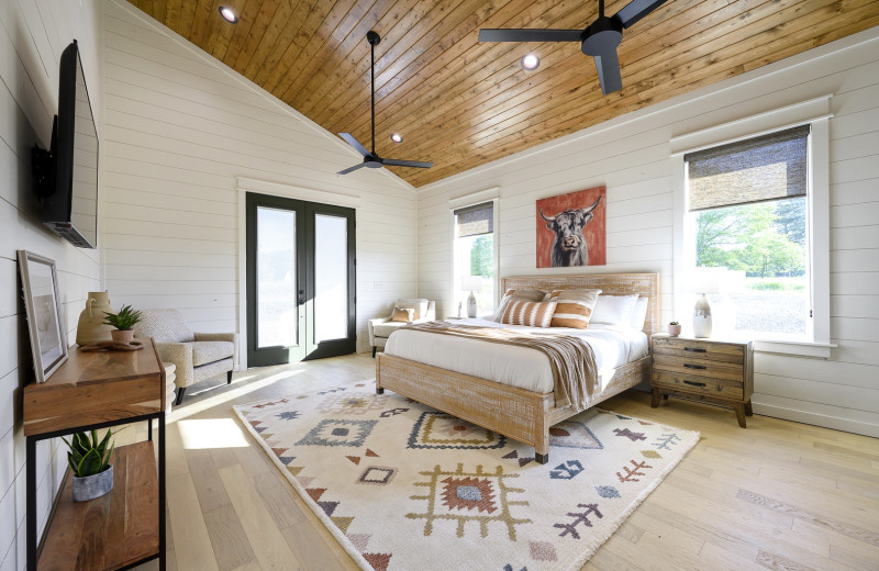Rental bedroom at Blue Beaver Luxury Cabins.