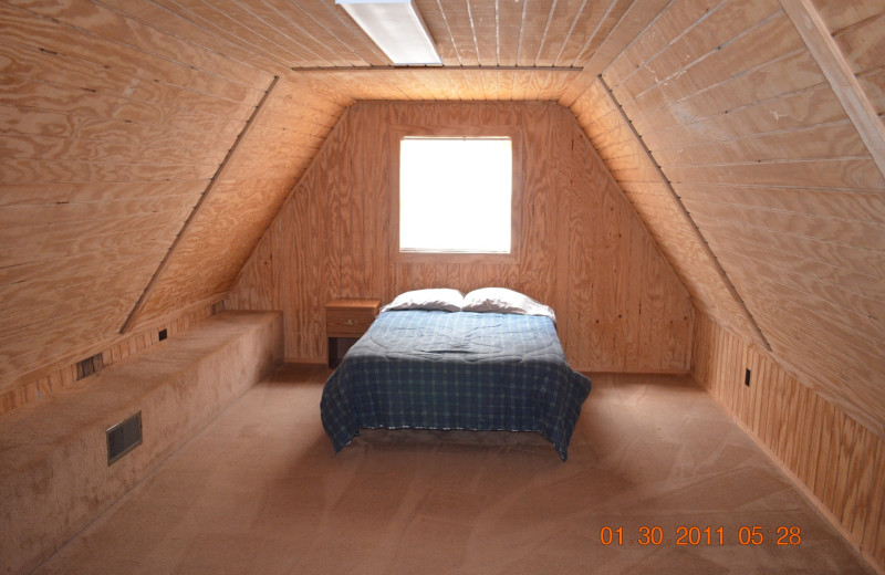 Cabin bedroom at Big Buck Resort.